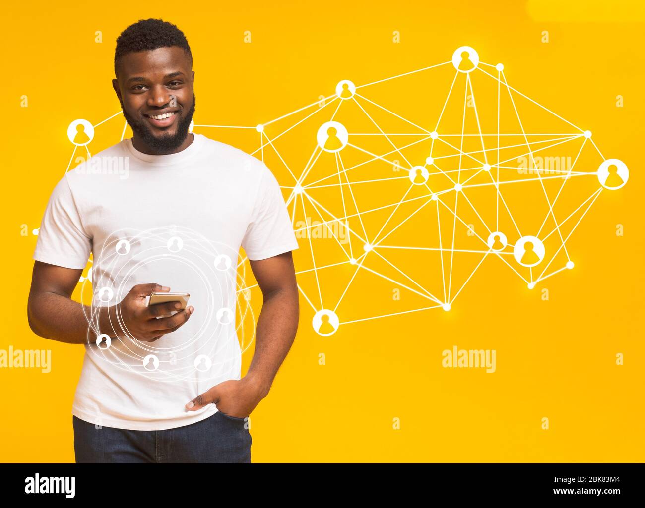 Black man using smart phone with holograms datas Stock Photo
