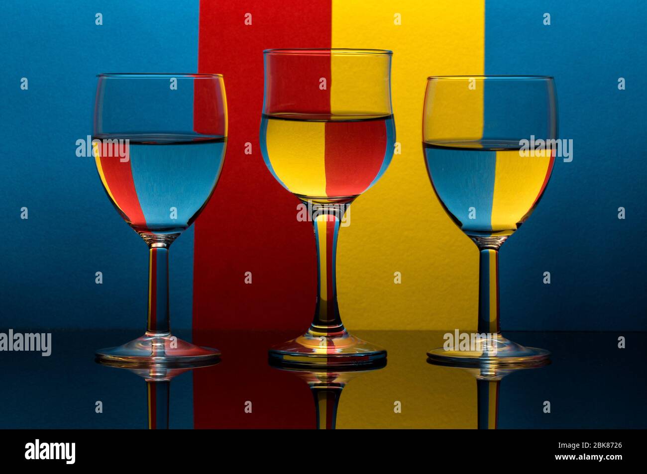 colored reflections in wine glass Stock Photo