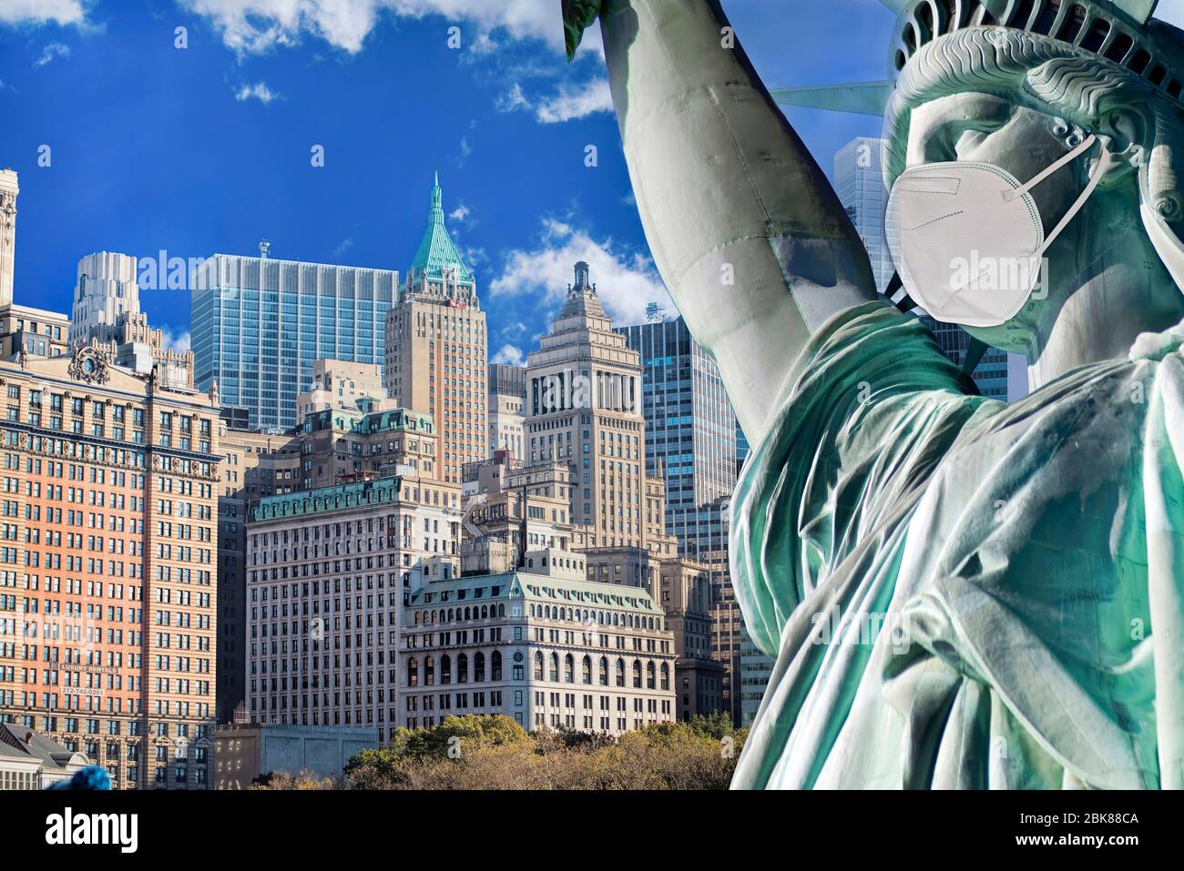 Statue of Liberty wearing face mask in NYC. Stock Photo