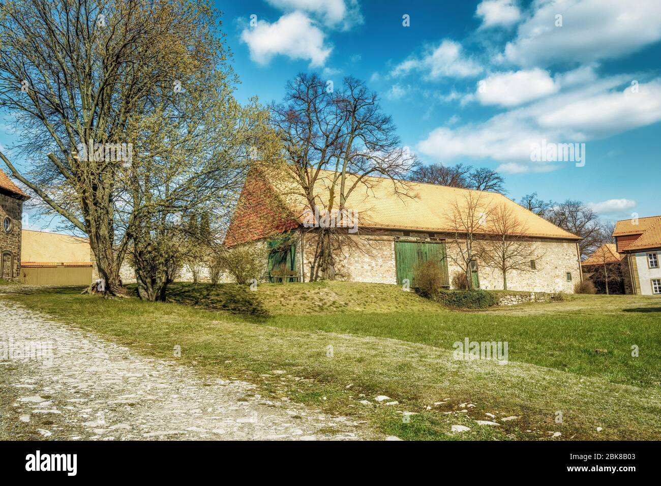 A Very Old Barn In A Yard In A Sunny Idyllic Mood Stock Photo Alamy