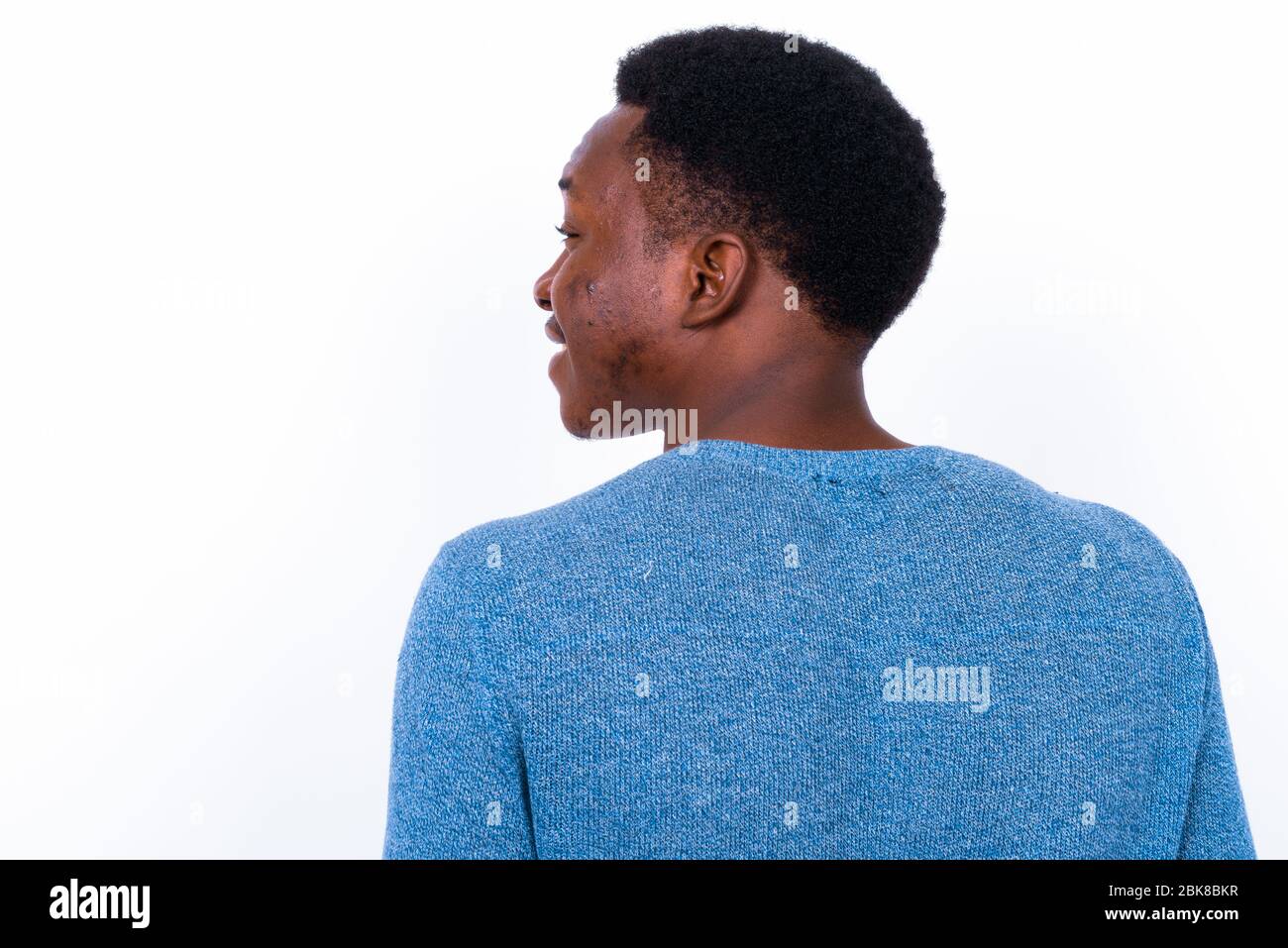 Young handsome African man against white background Stock Photo - Alamy
