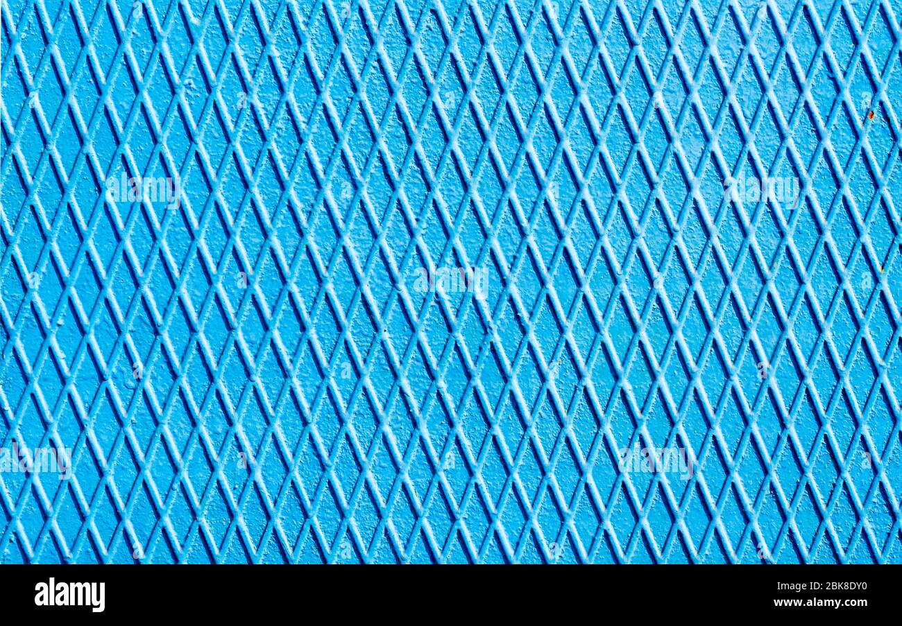 blue iron wall with intersecting lines abstract geometric background Stock Photo