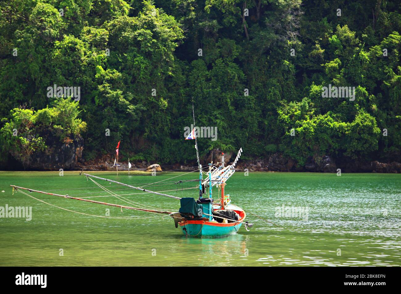 Wooden fishing boat rest on bang saphan beach, Prachuap Khiri Khan, Thailand Stock Photo