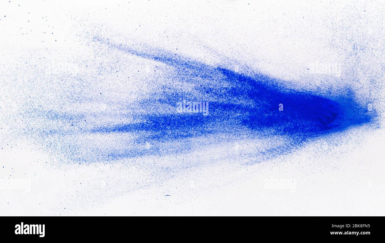Explosion of blue food coloring on white background Stock Photo Alamy