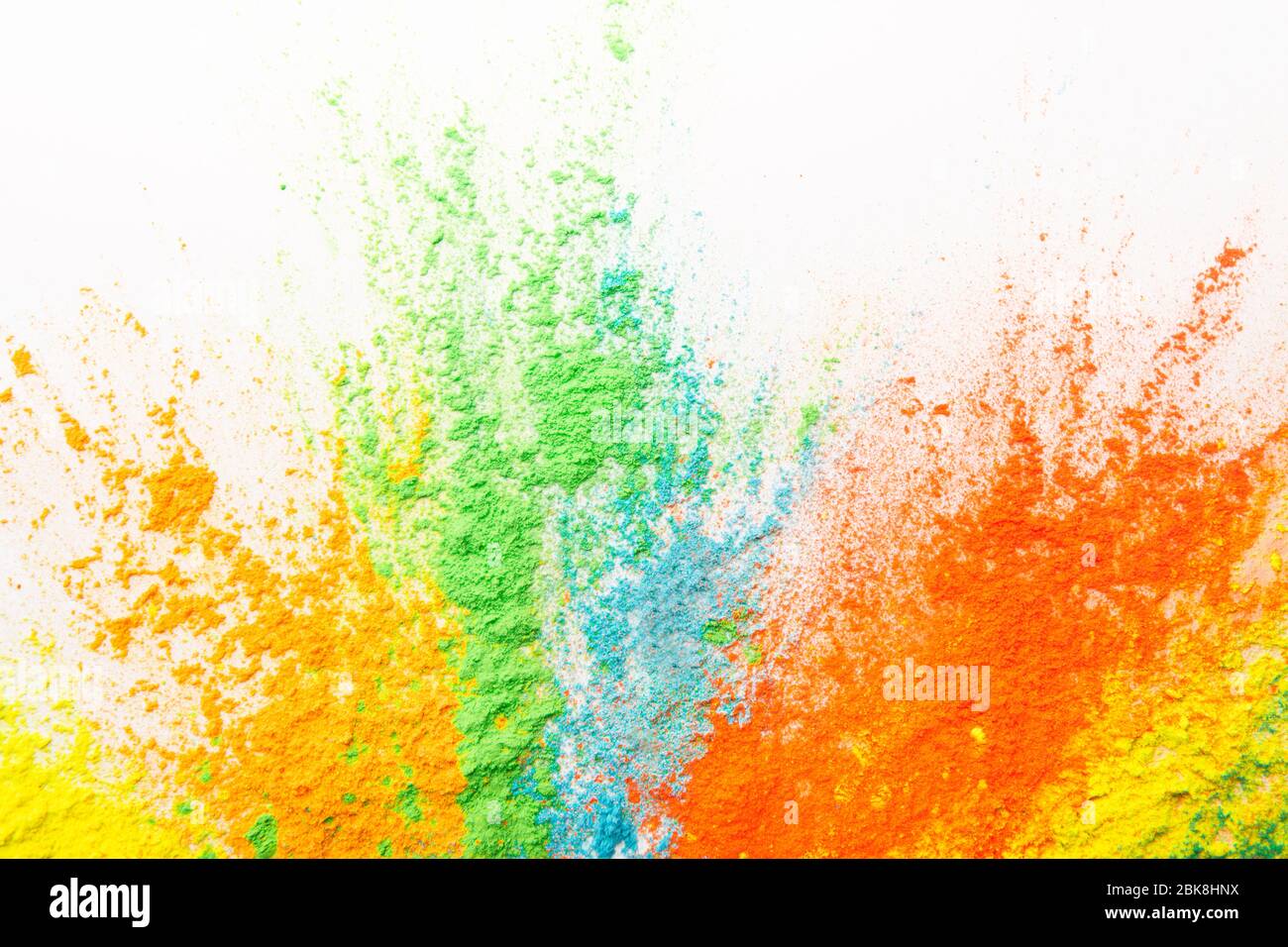 Beautiful multicolor powder explosion on white background Stock Photo