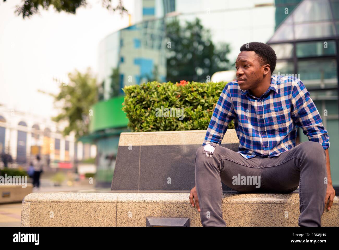 Side view young modern african hi-res stock photography and images - Alamy