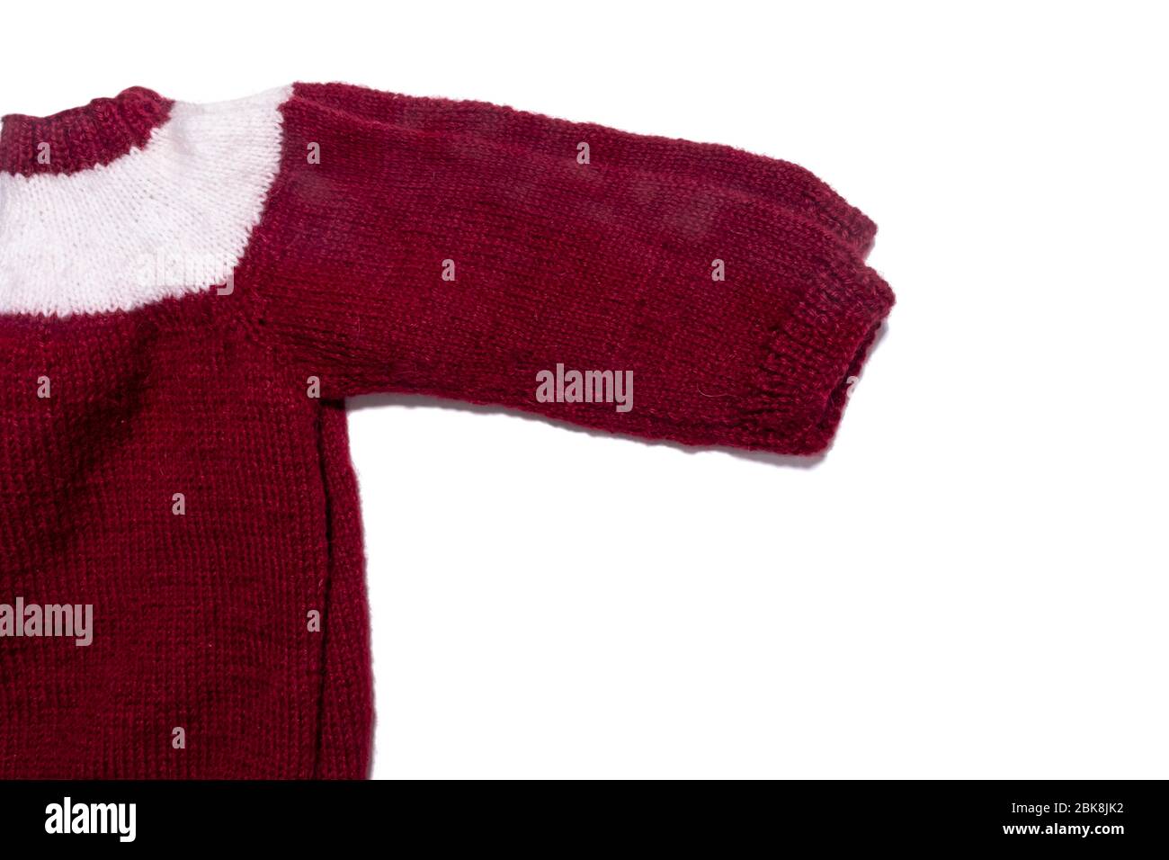red sweater with one white stripe