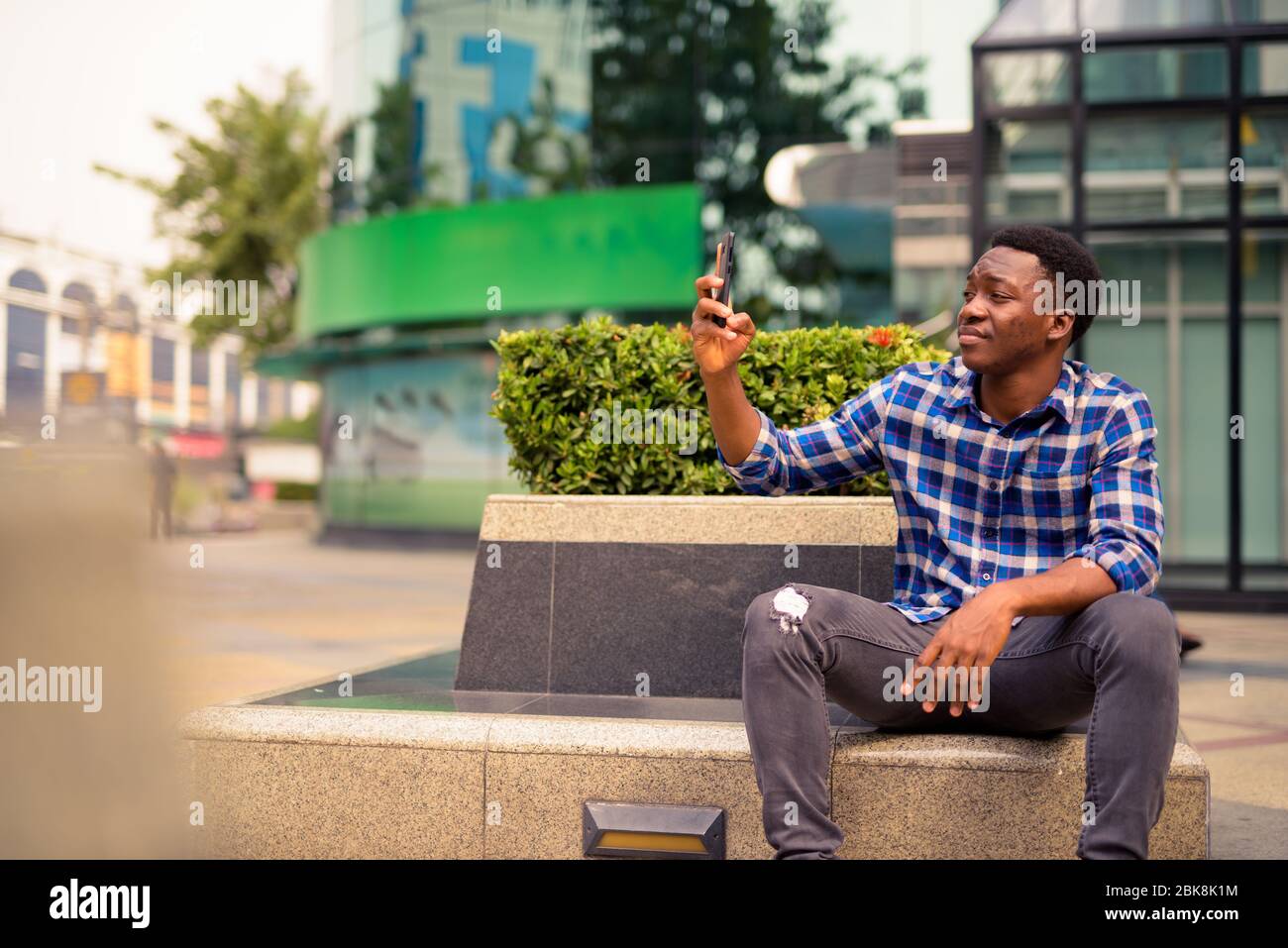 Side view young modern african hi-res stock photography and images - Alamy