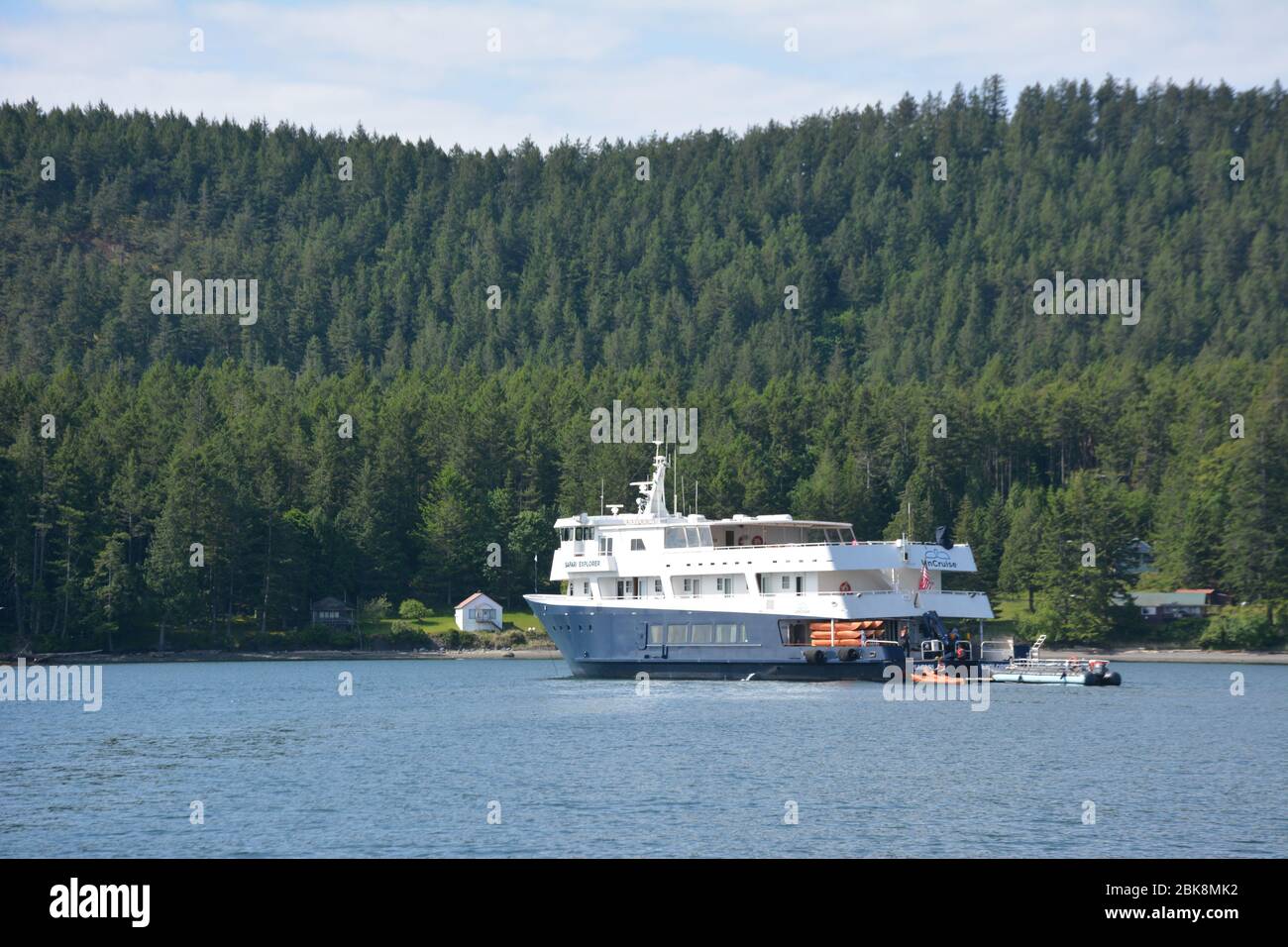 the Safari Explorer, a small cruise ship, drops anchor at Prevost