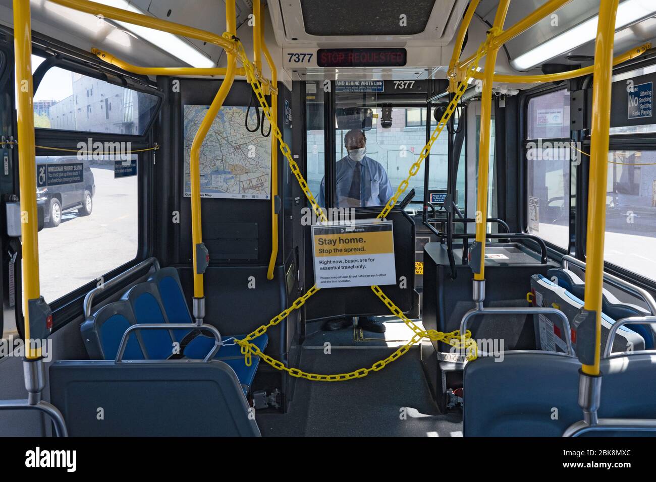 NEW YORK, NY - MAY 2, 2020:  pose on his bus at a MTA maintenance facility amid the COVID-19 pandemic. Stock Photo