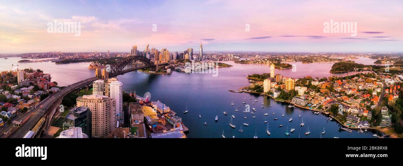 Sydney harbour and major city landmakrs around Lavender bay in aerial panorama at sunrise. Stock Photo
