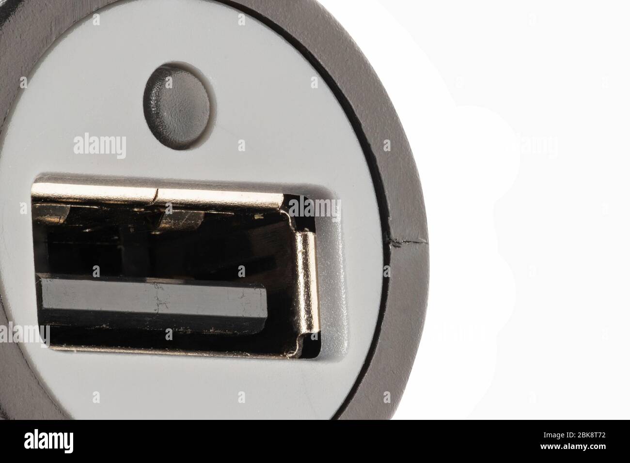 horizontal view in foreground of a car lighter charger with usb connector Stock Photo