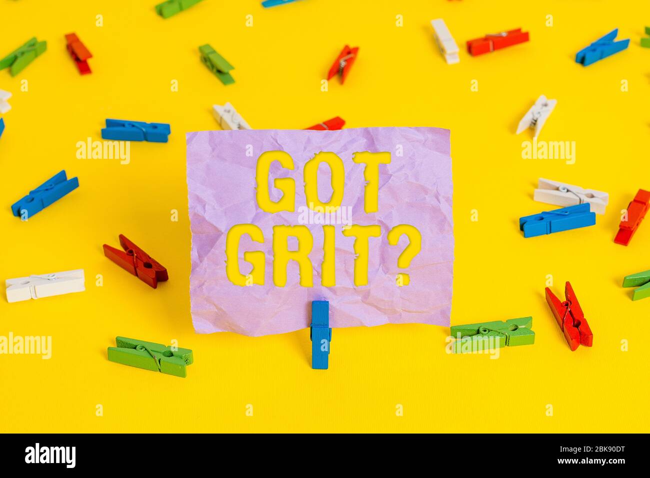 Word writing text Got Grit Question. Business photo showcasing A hardwork with perseverance towards the desired goal Colored clothespin papers empty r Stock Photo