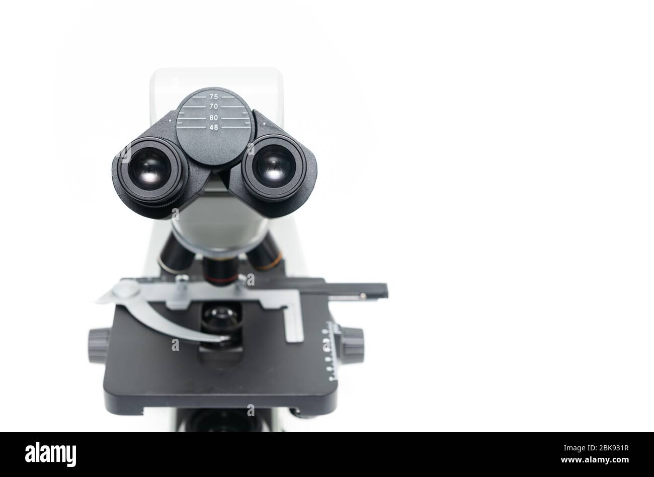 closed up of microscope isolated on white background, science and technology concept Stock Photo