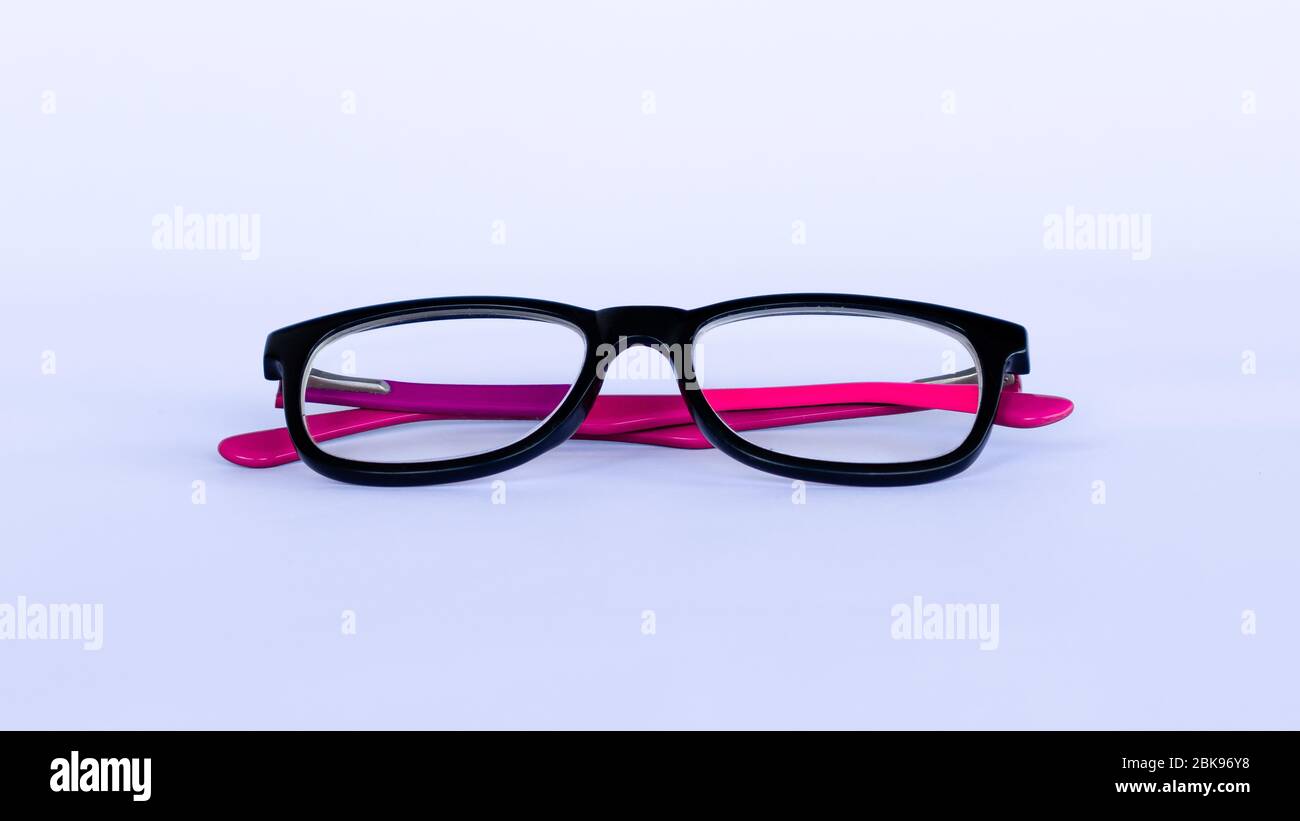 Black Folded Spectacle in white neutral background Stock Photo