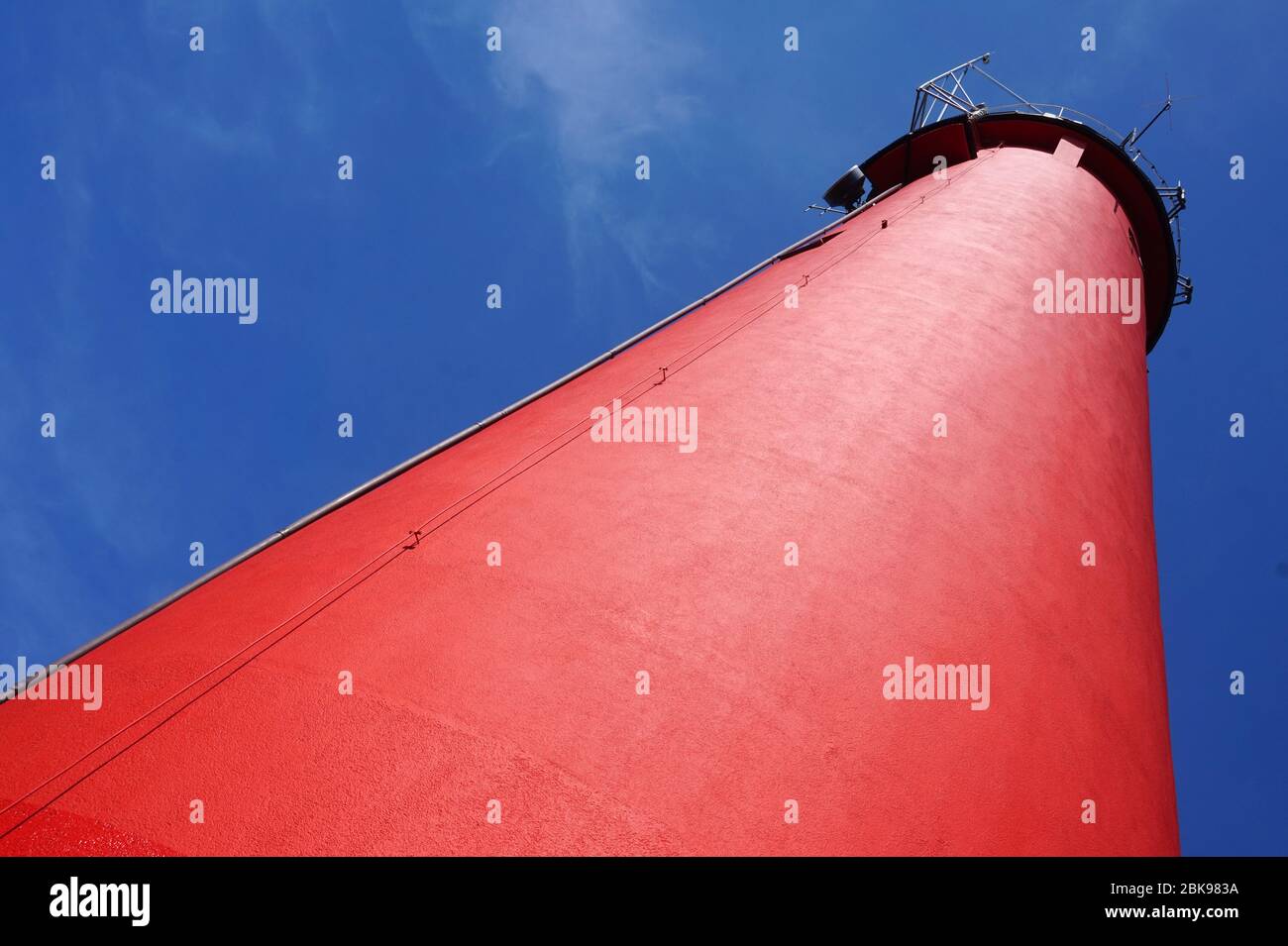 Red lighthouse - view from below Stock Photo - Alamy
