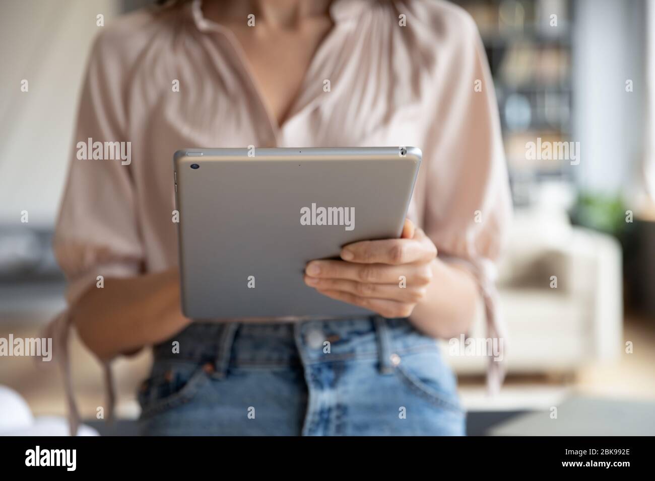Woman hands holding tablet hi-res stock photography and images - Alamy
