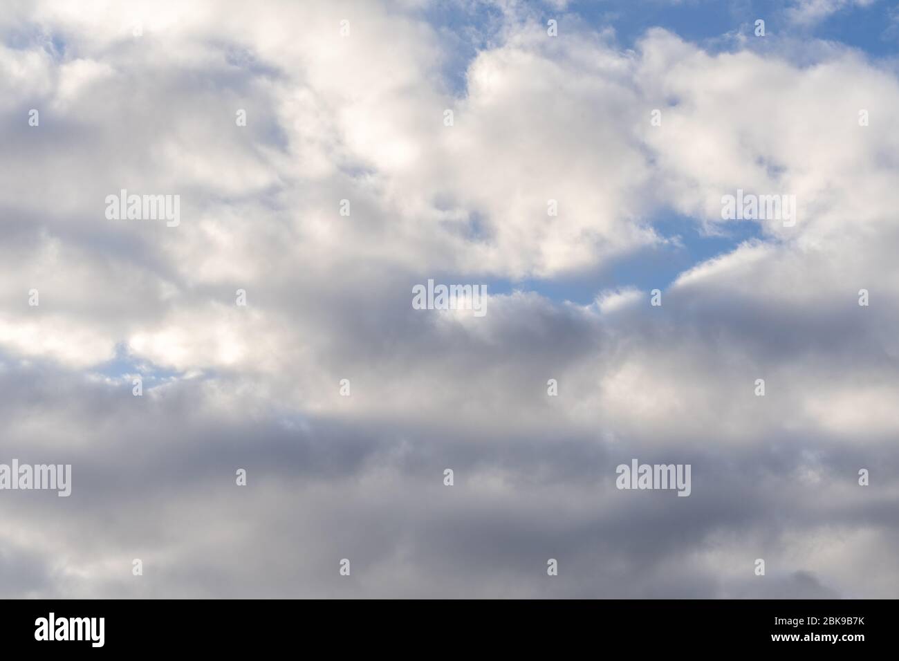 blue sky with beautiful contrasting clouds. Spindrift clouds Stock Photo