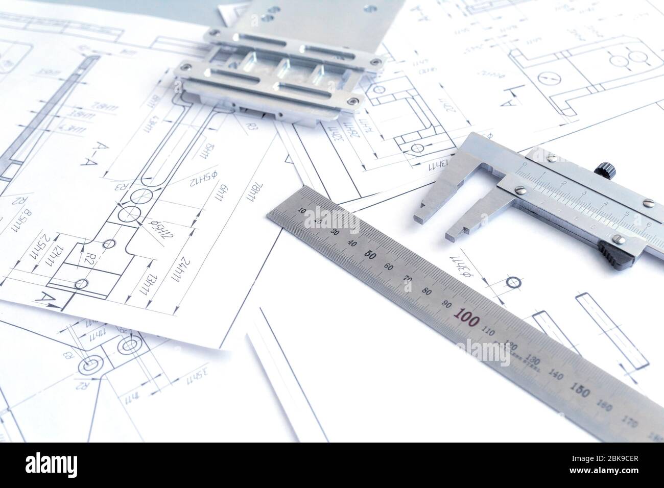 Top view of a caliper measuring tool, ruler and detail drawings