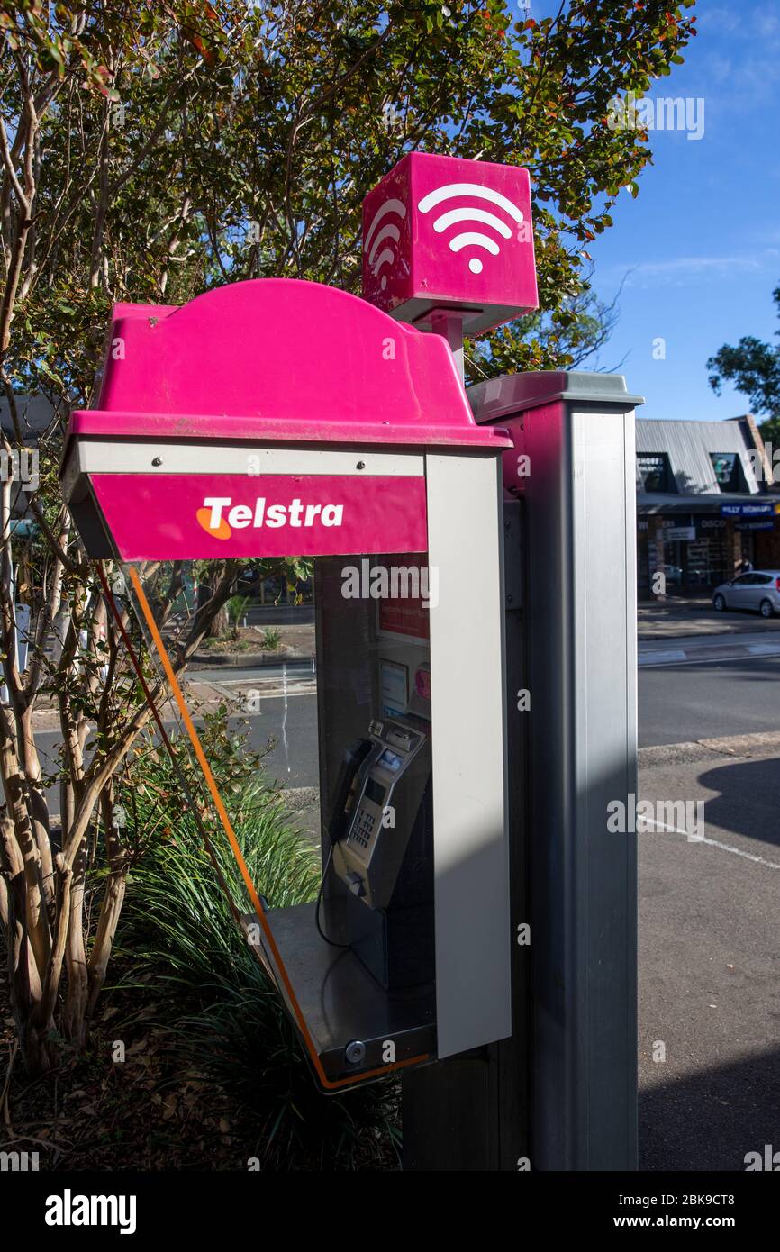 Australia, Telstra public phone box booth on a Sydney street, Australia, Telstra is a national communications carrier Stock Photo