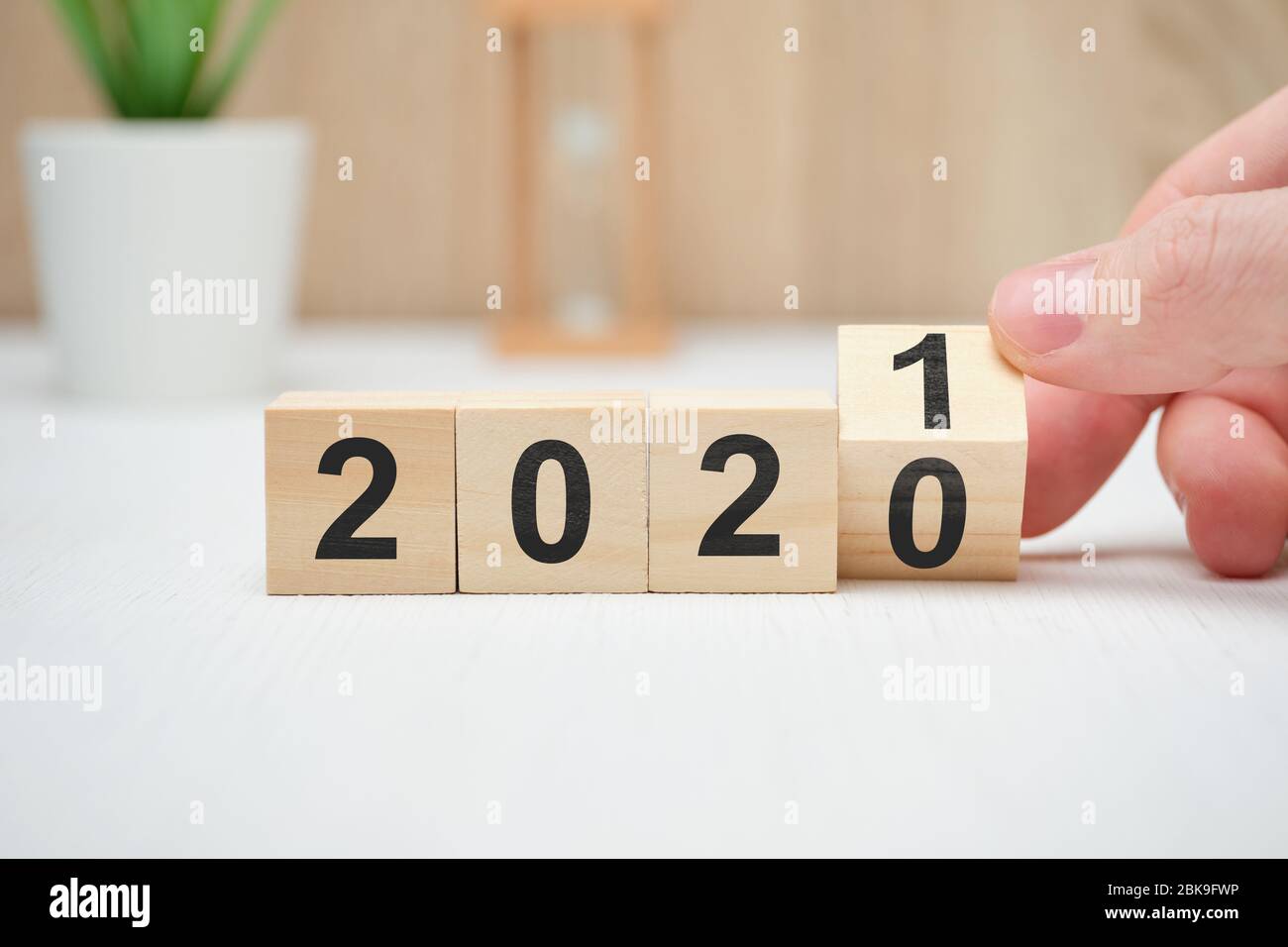 The concept of changing the year from 2020 to 2021 and the results of operations. Close up. Stock Photo