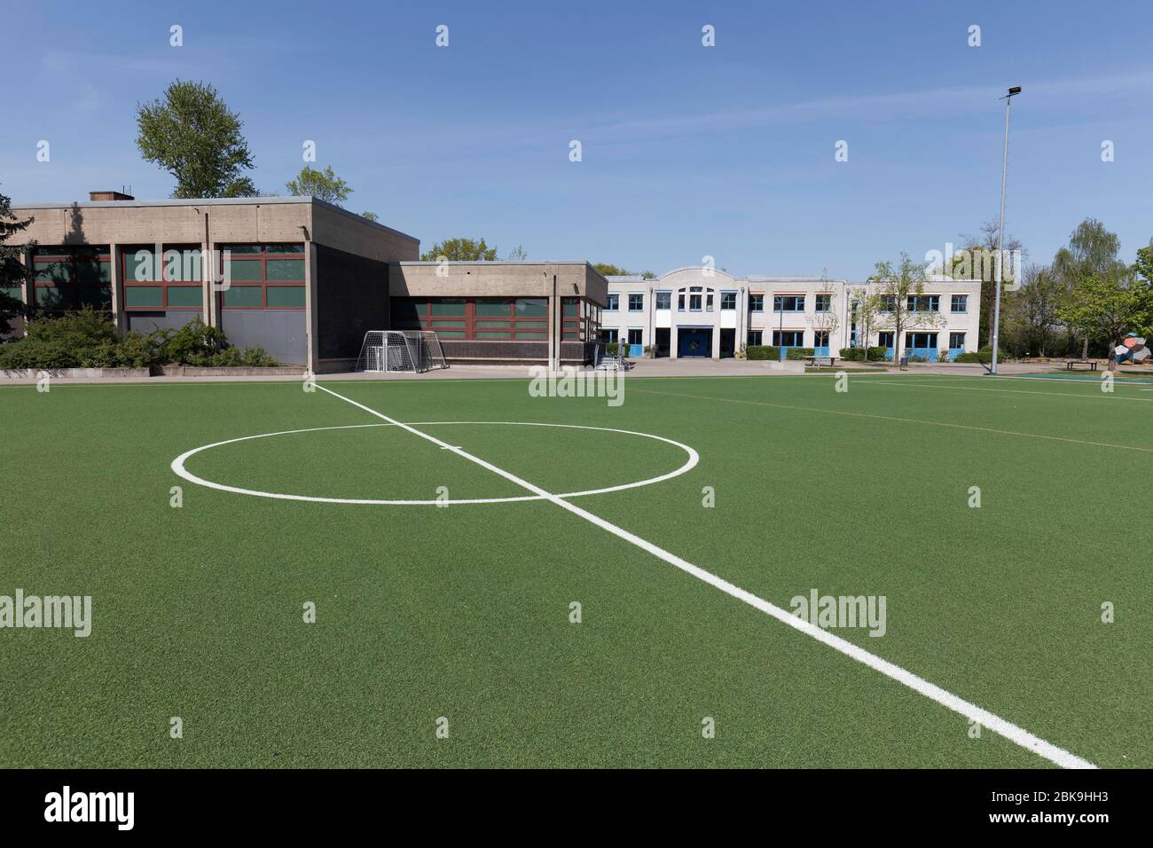 Empty football pitch of a school, closed due to Corona pandemic, Duesseldorf, North Rhine-Westphalia, Germany Stock Photo