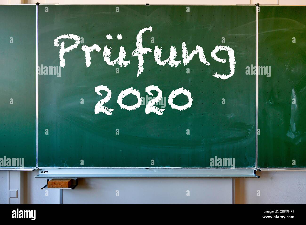 Blackboard with inscription PRUeFUNG 2020, Corona crisis, Germany Stock Photo