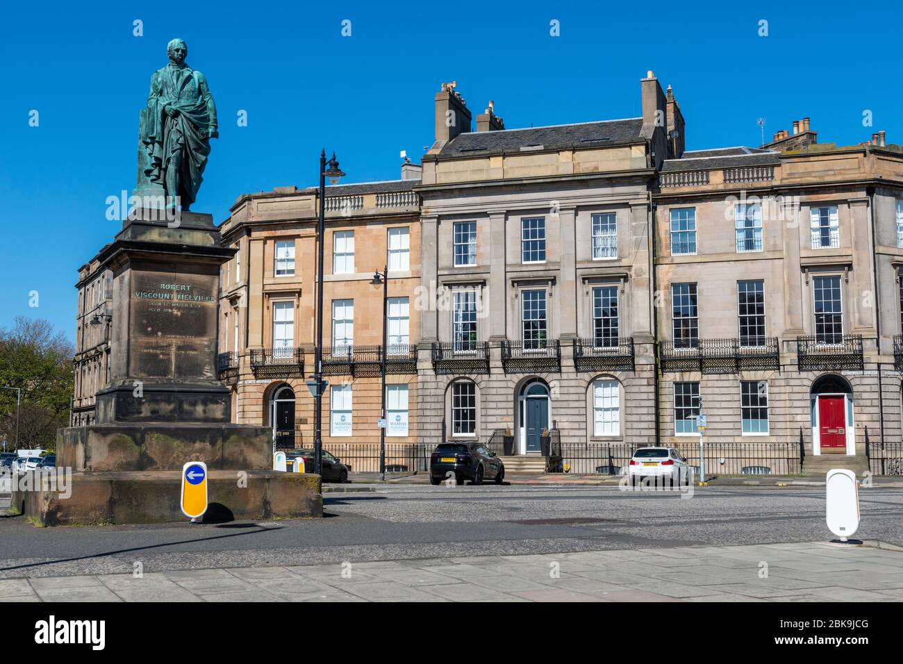 Victorian townhouses on Melville Crescent with statue of Robert Dundas