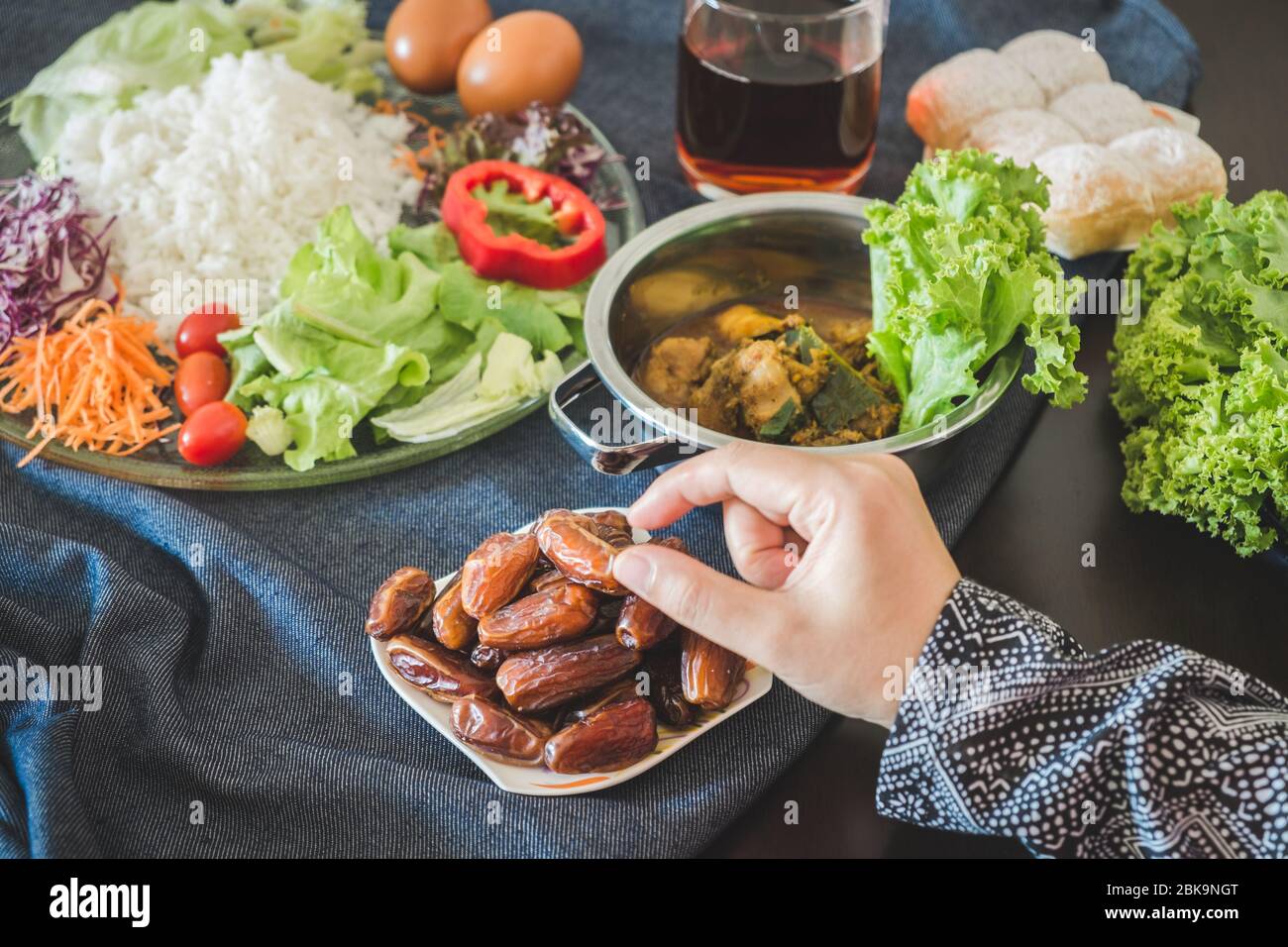 Organic dates palm fruit serving during Iftar and sahoor meal on dining