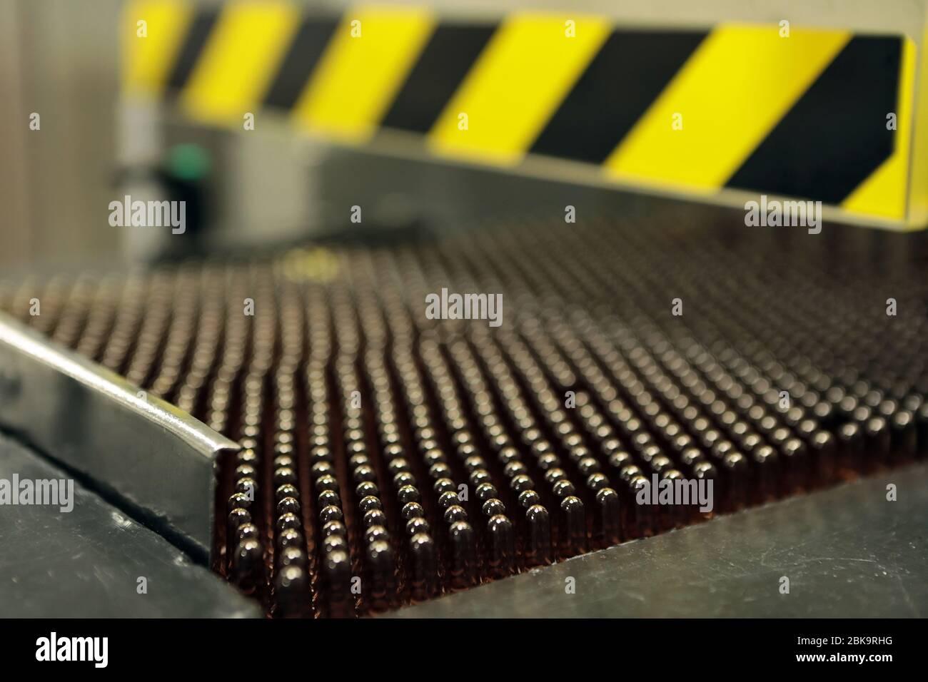 Sterile bottles and ampoules on the dispensing line. Sealed ampoules