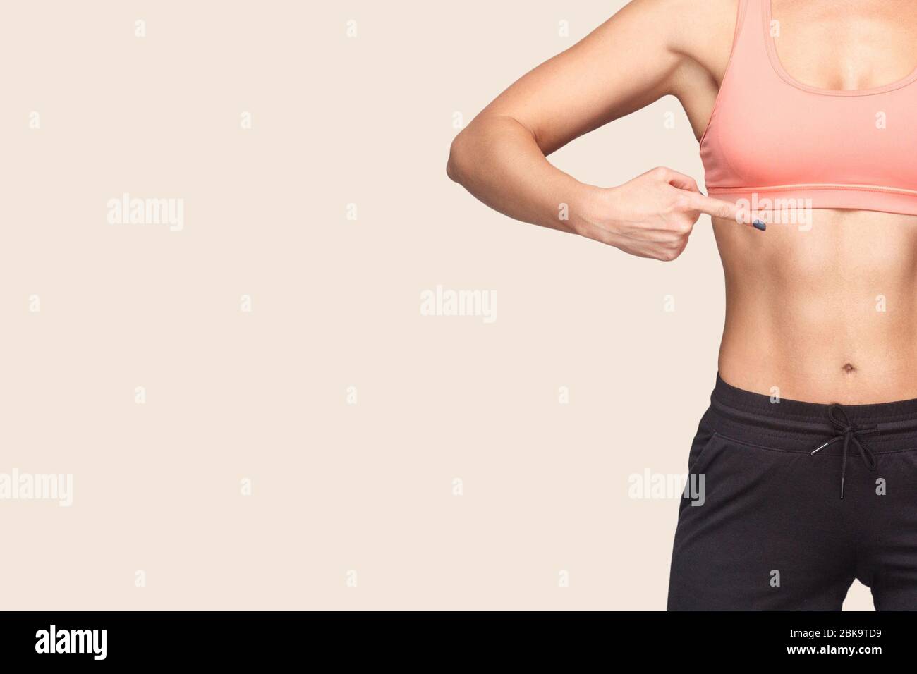 Slim and fit female athletic body stock photo containing fitness and