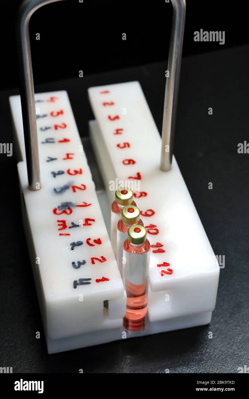 Quality Control vials for injection. Individual checks vial under a microscope. New