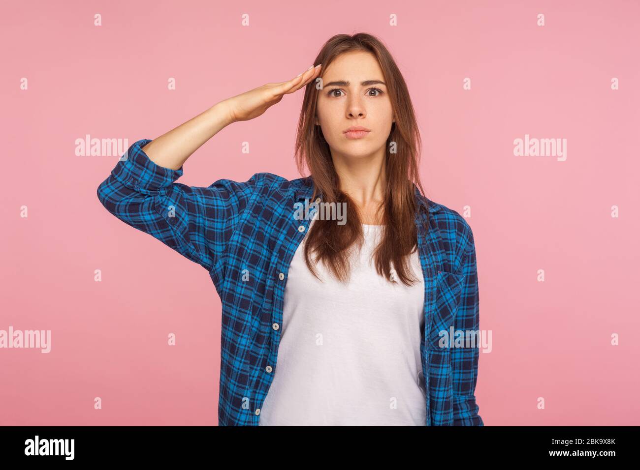 Yes sir! Portrait of patriotic confident young woman in checkered shirt ...