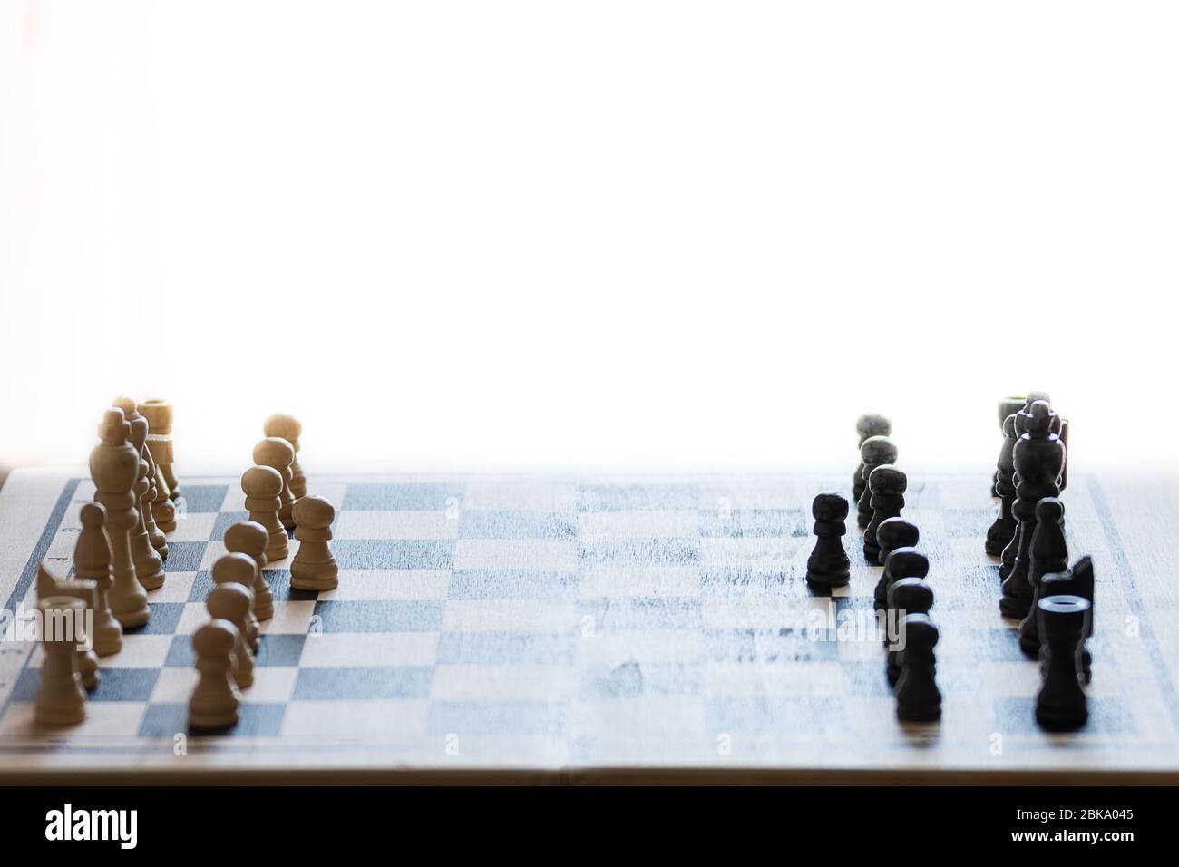 Chess pieces on the chess board with selective focus. Business and motivation concept. Copy space Stock Photo