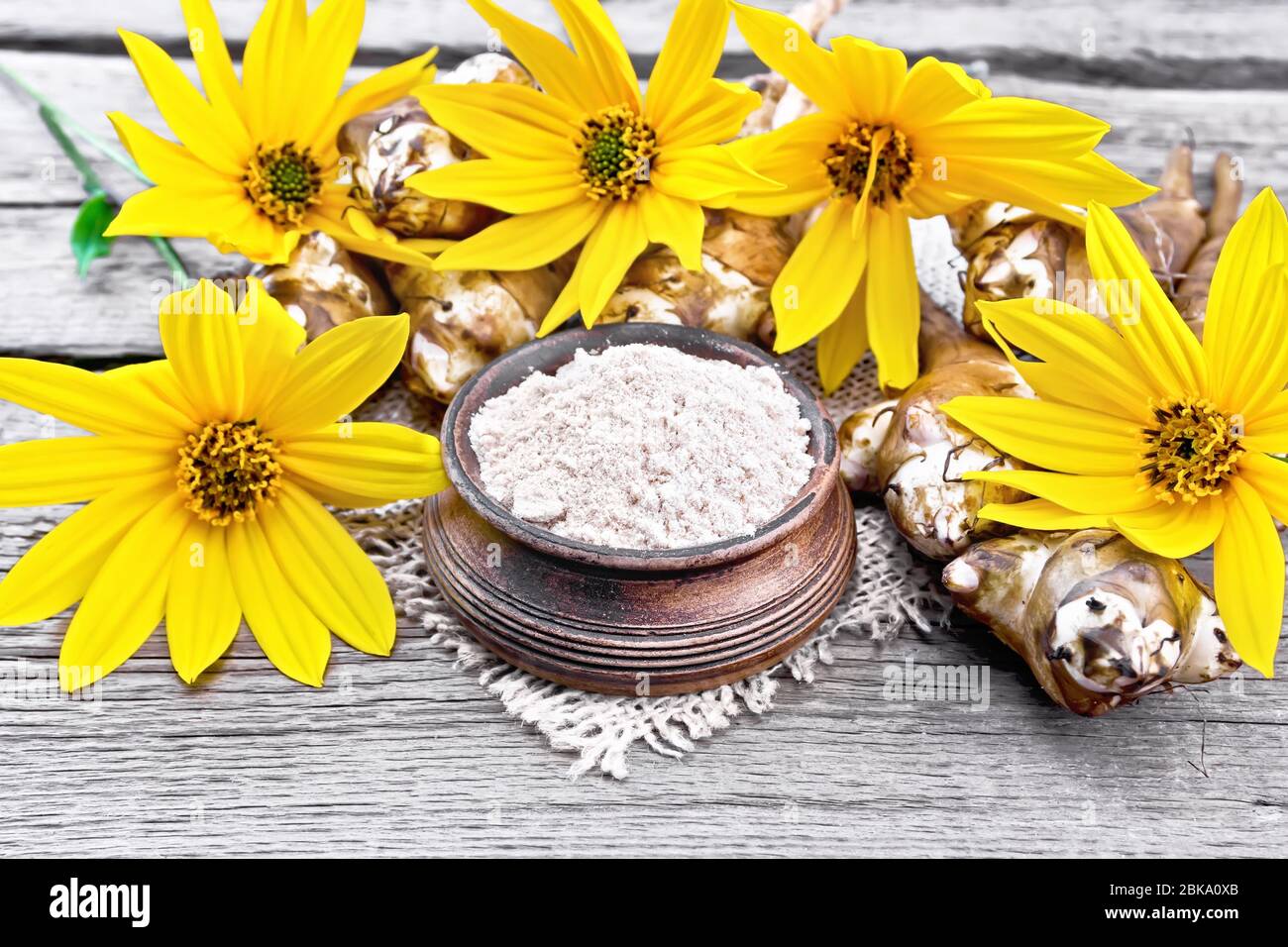 Jerusalem Artichoke Flour In A Clay Bowl On A Burlap With Yellow Flowers And Vegetables On Wooden Board Background Stock Photo Alamy