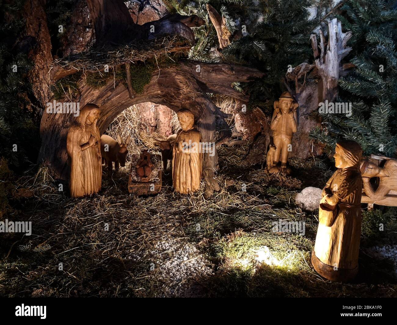 Ossana, Italy - December 26, 2019: Nativity scene made with hand-carved wooden figurines. Stock Photo