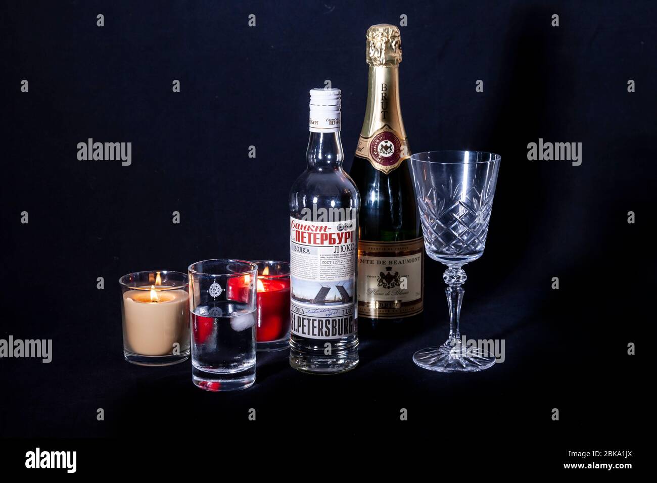 Bottles of drink against a black background Stock Photo