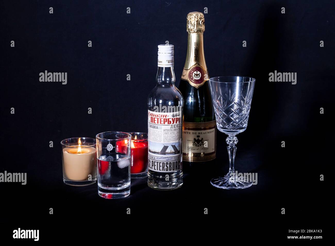 Bottles of drink against a black background Stock Photo