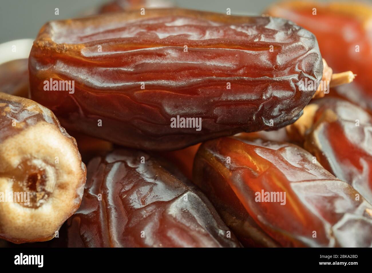 Raw date fruit ready to eat. Traditional, delicious and healthy ramadan food. Detailed view. Stock Photo