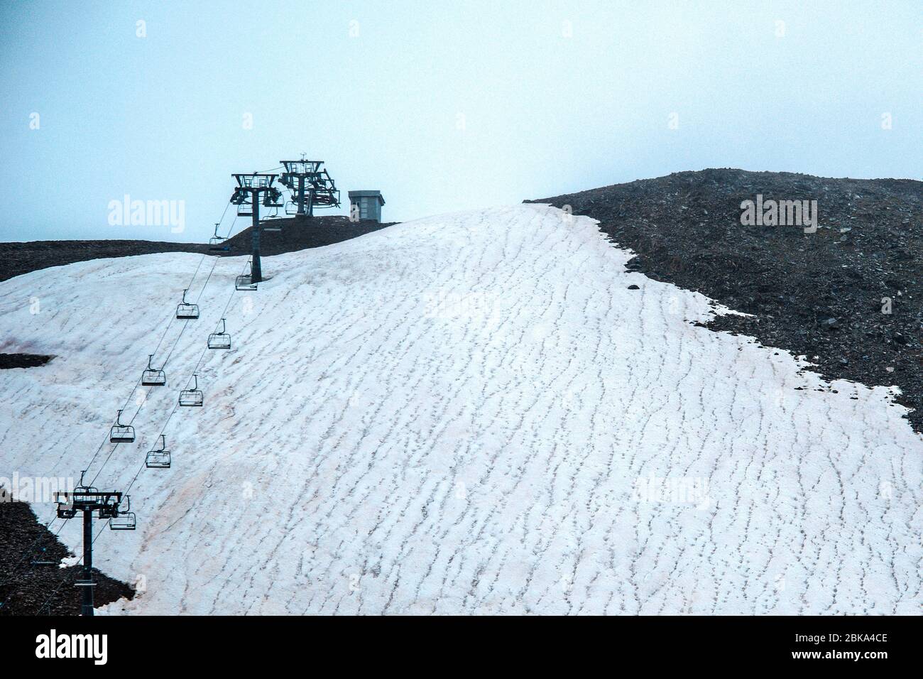 cable car on a mountain slope cable cars running up and down Stock Photo