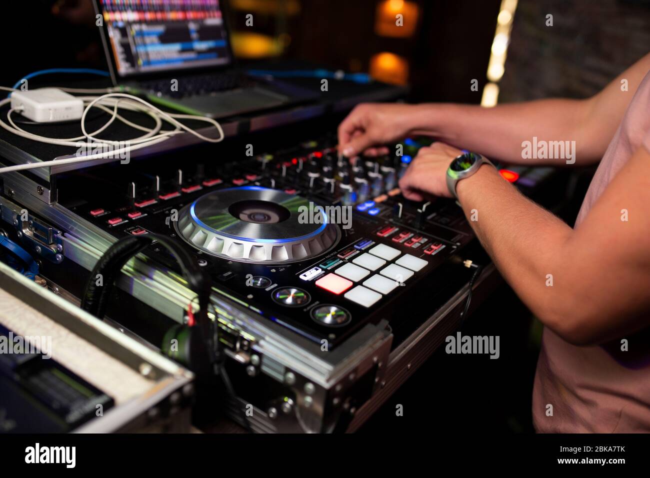 DJ plays music in the club Stock Photo Alamy