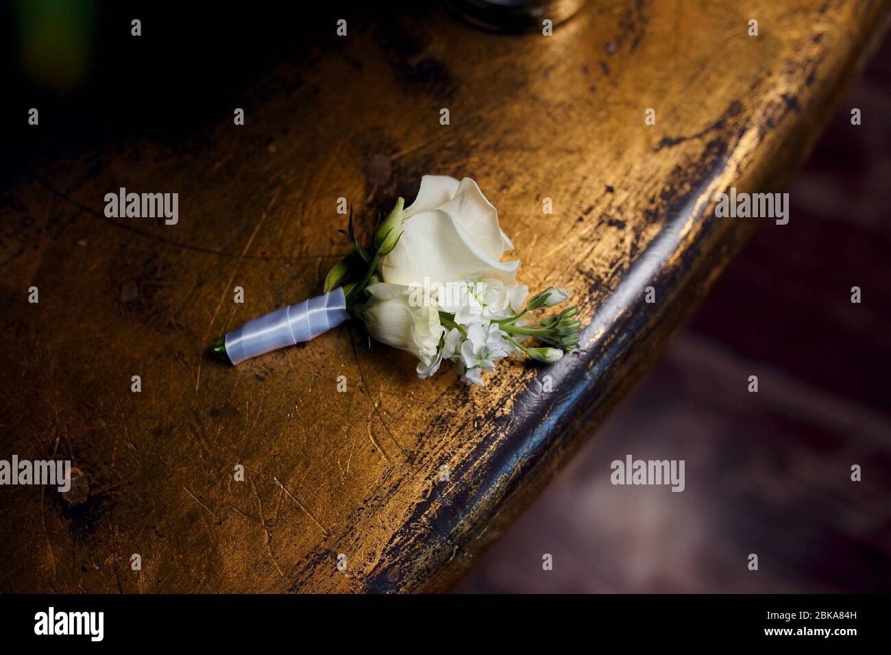 rose boutonniere on a beautiful background Stock Photo - Alamy