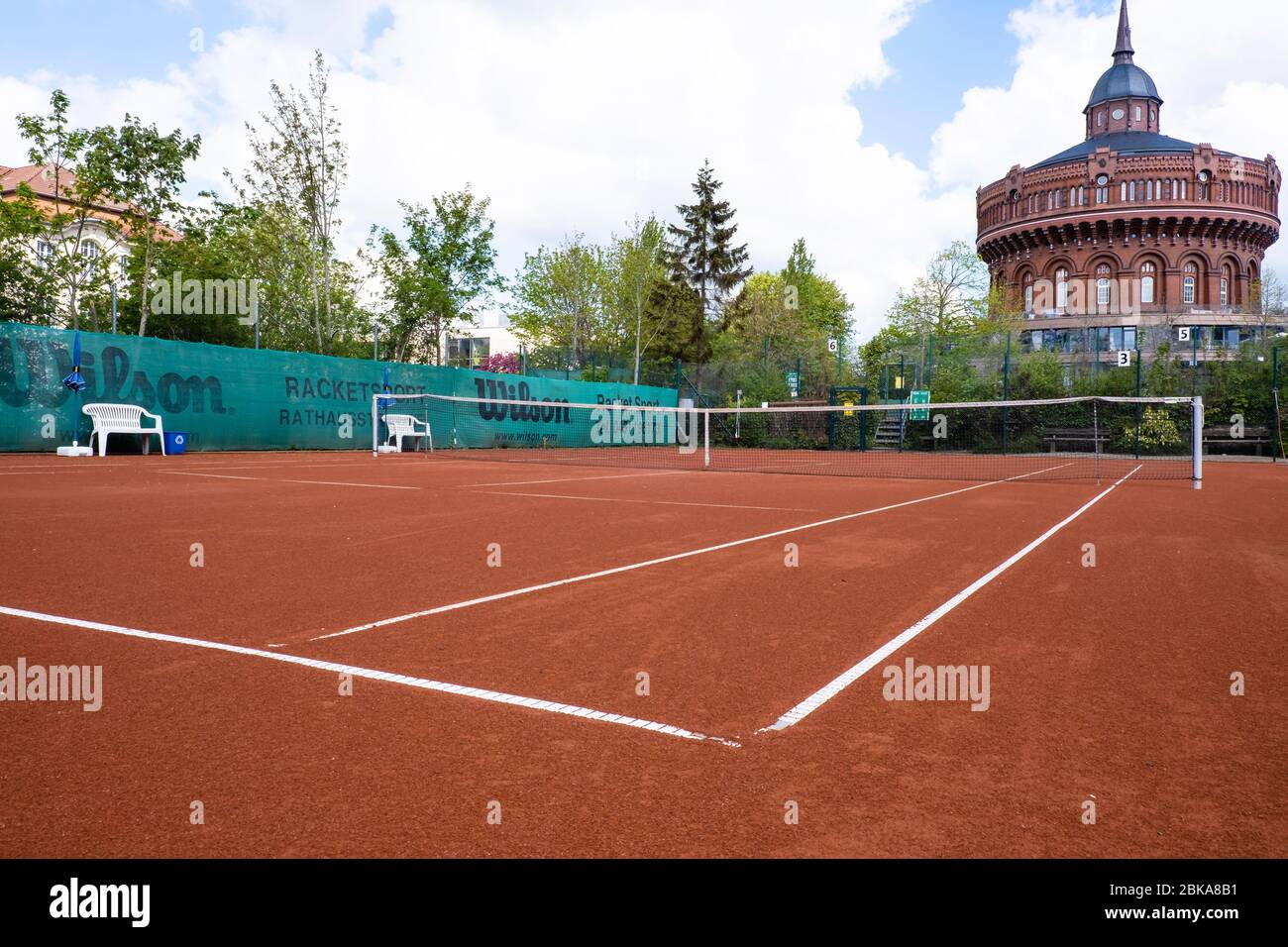 Kiel, Germany. 03rd May, 2020. A tennis court in the Ravensberg district is  prepared for the start of the season. From 4 May 2020, tennis may be played  in Schleswig-Holstein under strict