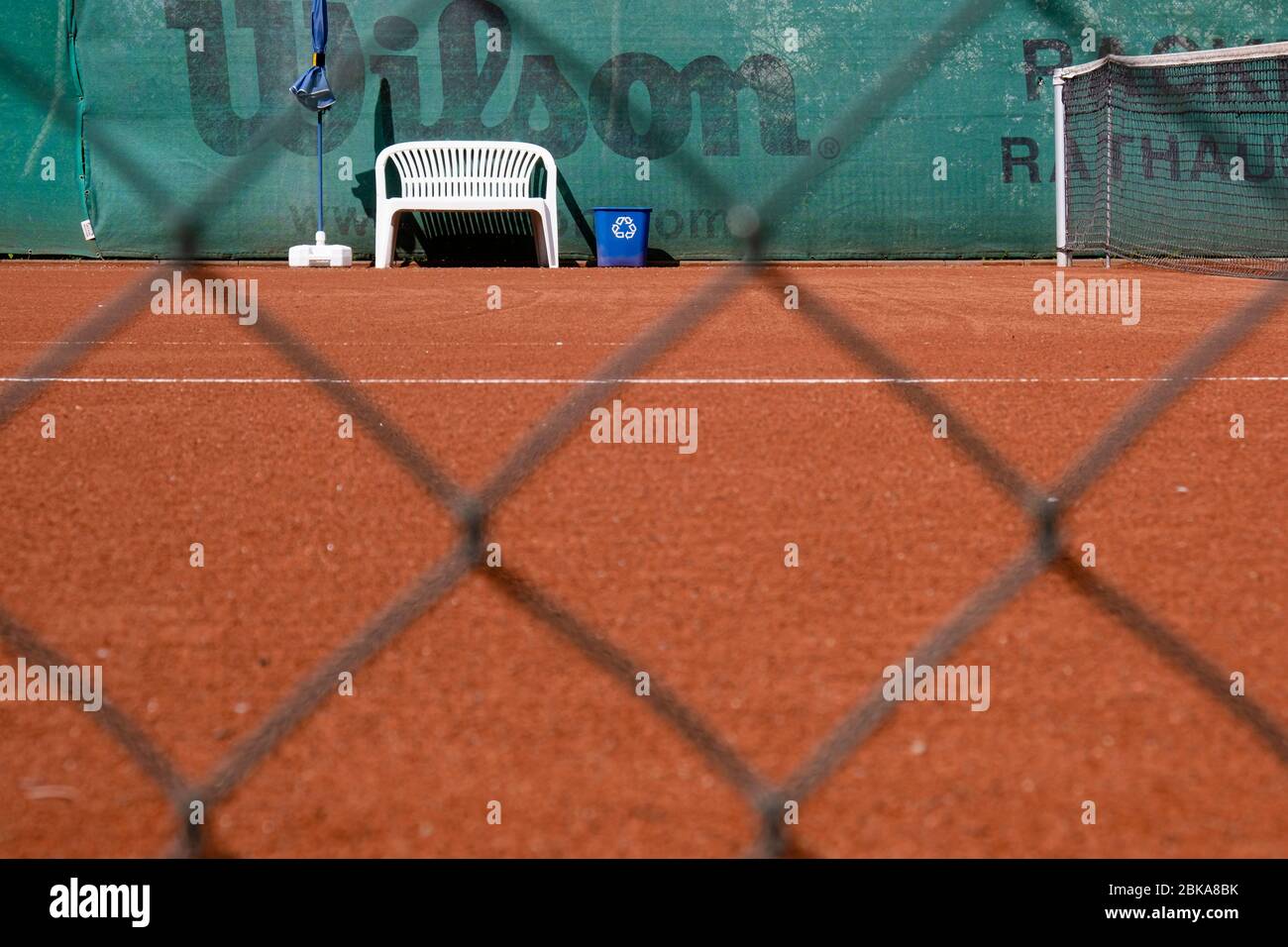 Kiel, Germany. 03rd May, 2020. A players' bench is set up at a large  distance from the net post on a tennis court in the Ravensberg district of  Schleswig-Holstein, and from 4