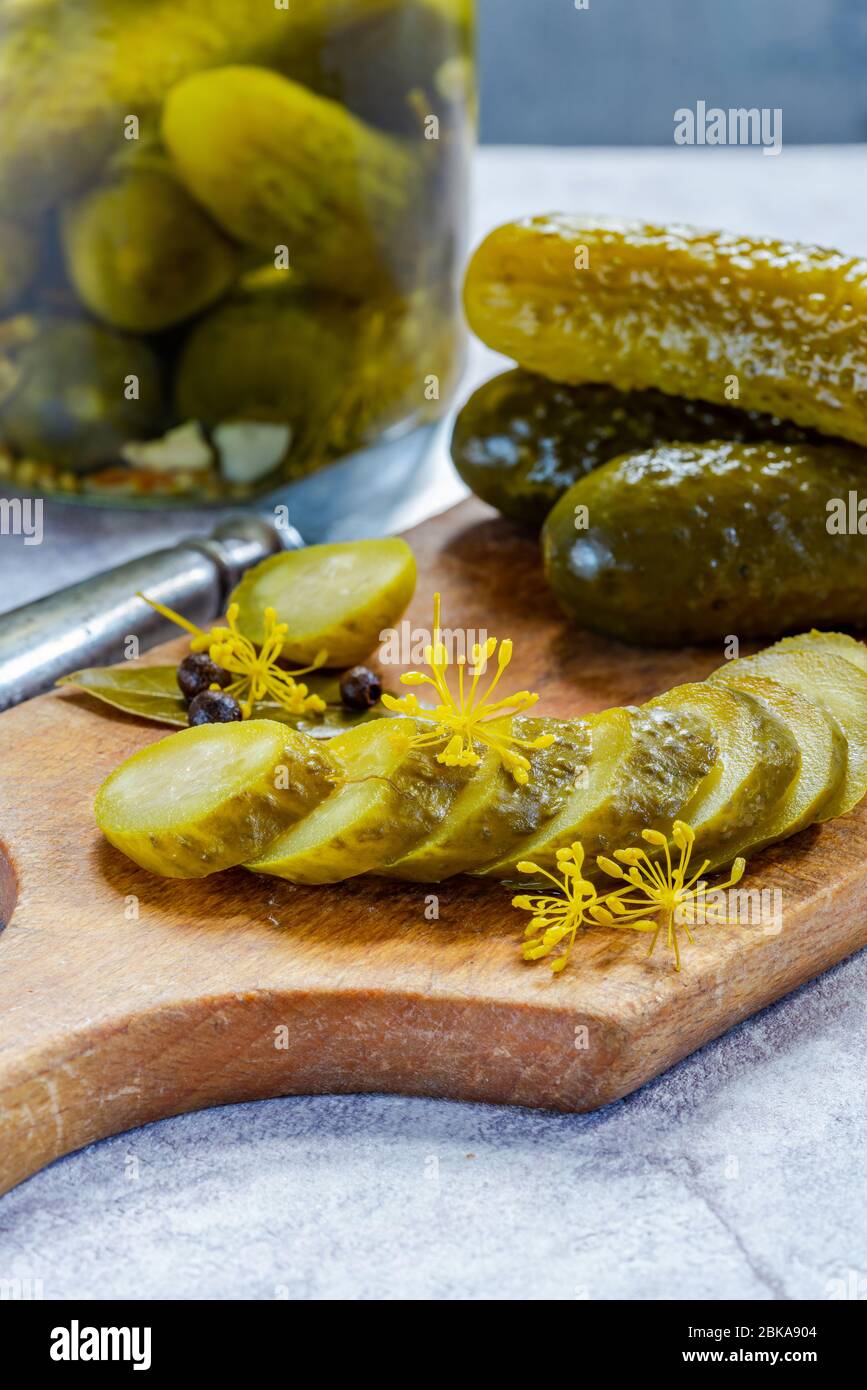 Cucumbers pickled in vinegar with dill and garlic Stock Photo Alamy