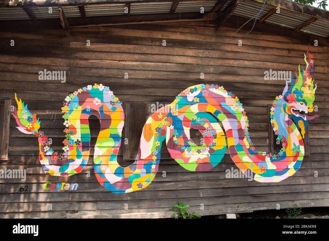 BUENG KAN, THAILAND - OCTOBER 3 : Graffiti painting on wall for thai people  travelers travel visit at street art in Life Community Museum at So Phisai  Stock Photo - Alamy