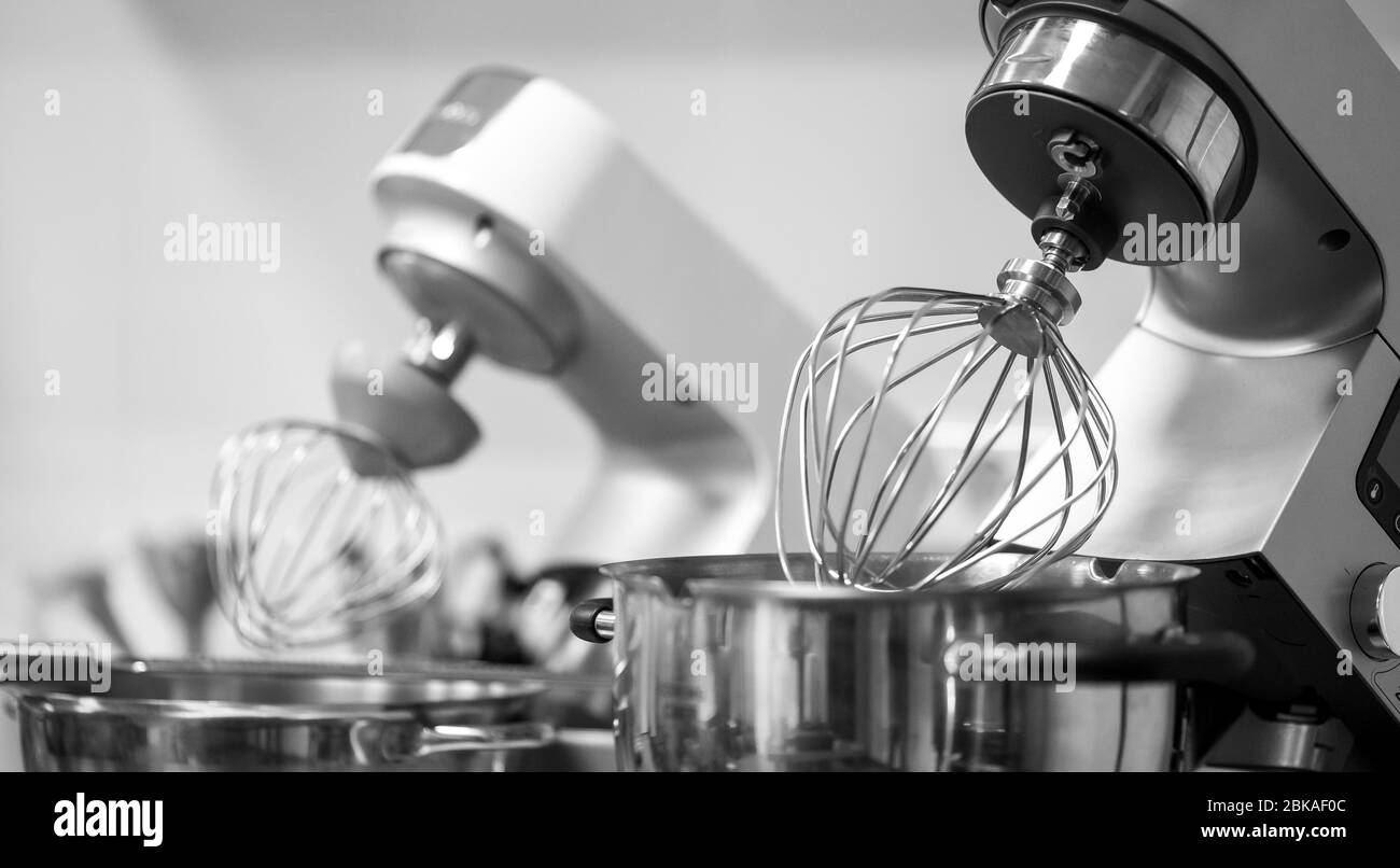 Professional steel electric mixer for kneading dough, cream in restaurant kitchen Stock Photo