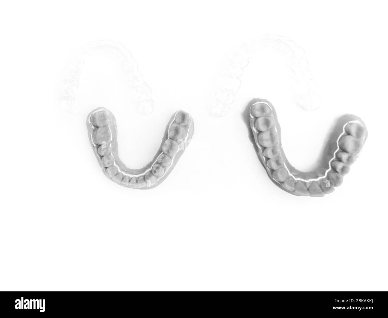 Gypsum model and transparent aligners, copy space Stock Photo