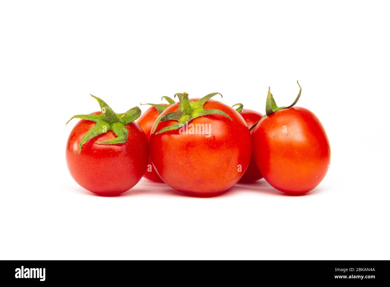 Red cherry tomatoes isolated on white background Stock Photo - Alamy