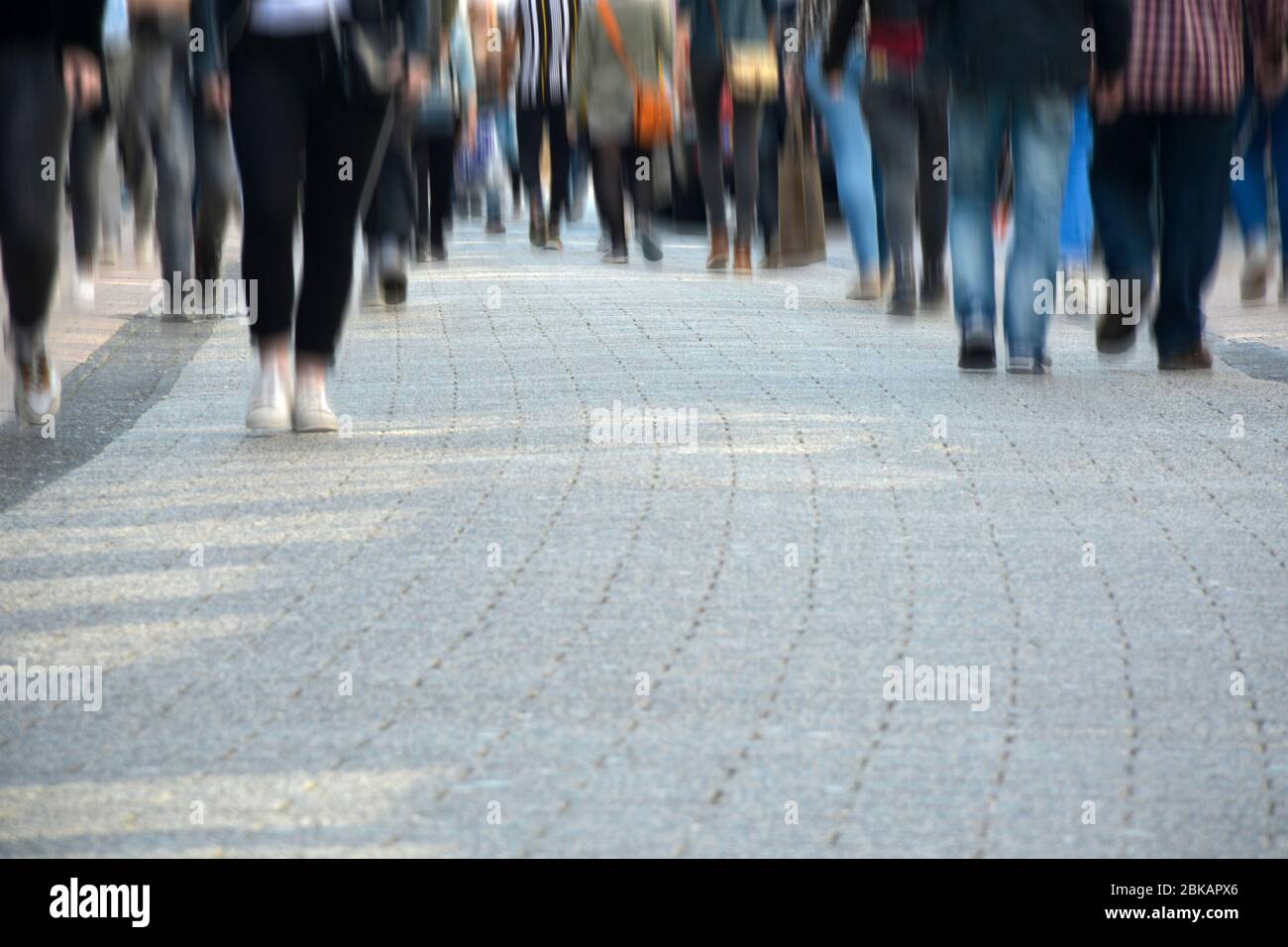 Image of unrecognizable crowd of people shopping in the city street. Motion blur Stock Photo